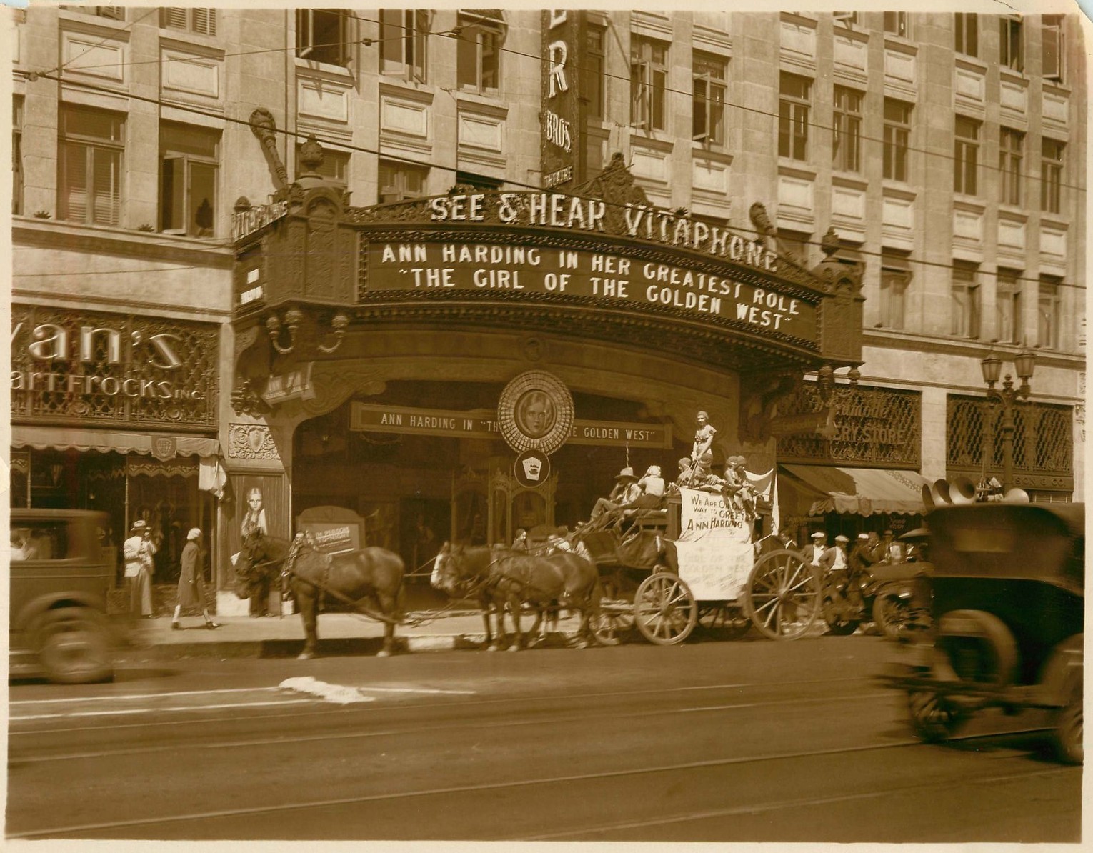 The lobby of the Warner Brothers Hollywood Theatre showing the revolving roulette wheel and stage coach used to exploit GIRL OF THE GOLDEN WEST